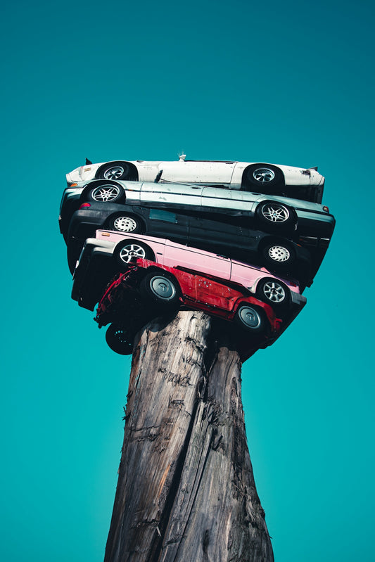 black and red car on brown wooden post